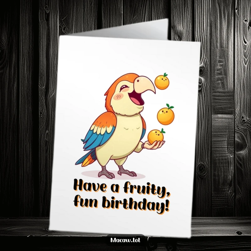 Funny Free Printable Birthday Card: A cute macaw gleefully squawks while juggling three colorful small fruits, full of joy.
